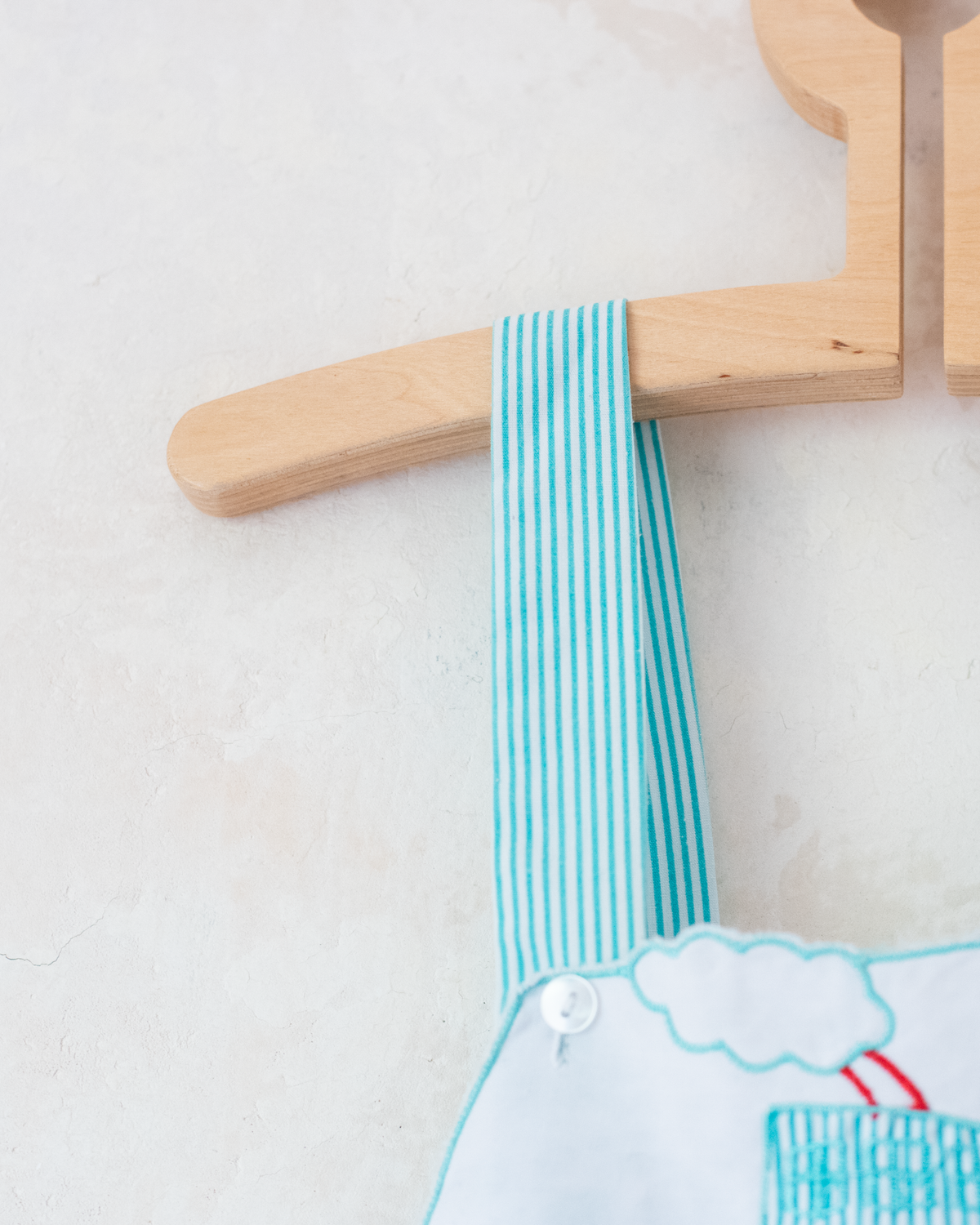 Striped overalls and embroidered ship | 9-12 months