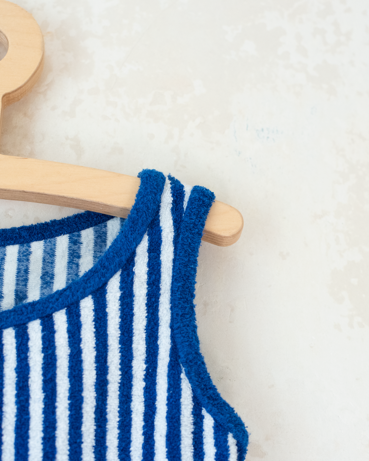 Blue striped toweling jumpsuit | 9-10 years