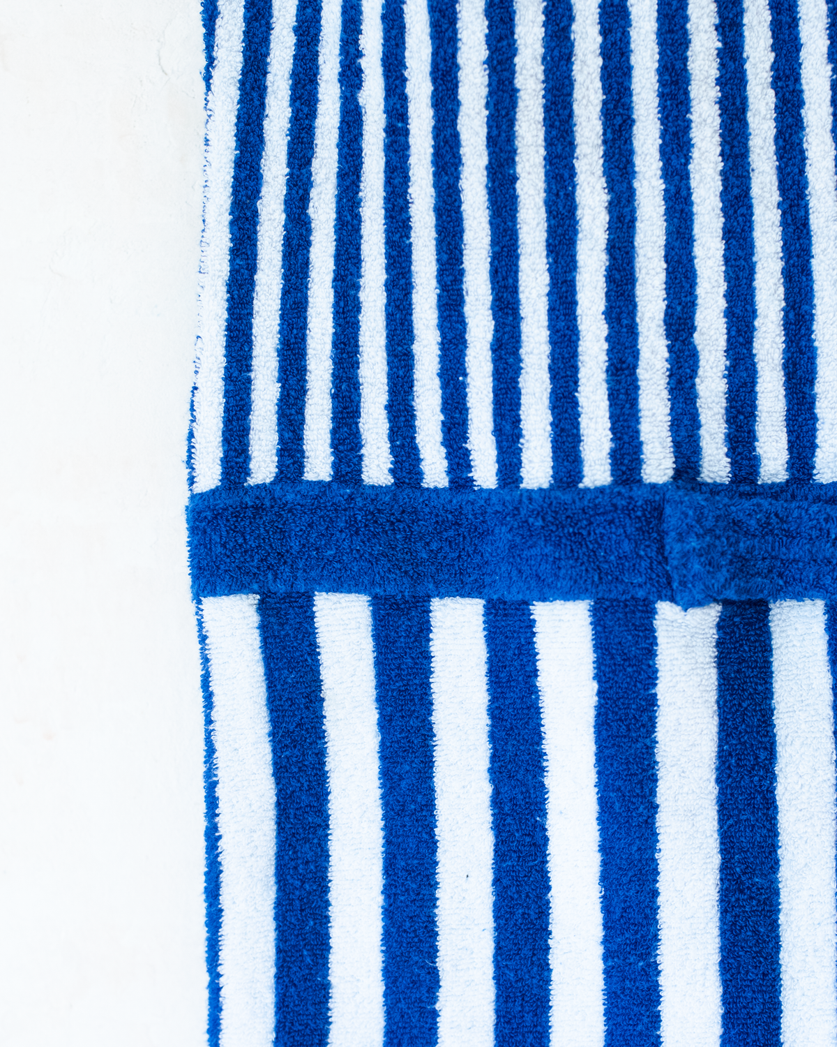 Blue striped toweling jumpsuit | 9-10 years