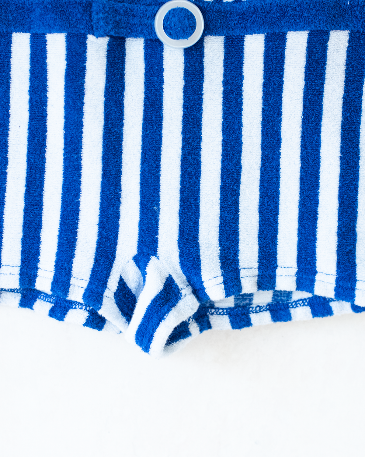 Blue striped toweling jumpsuit | 9-10 years