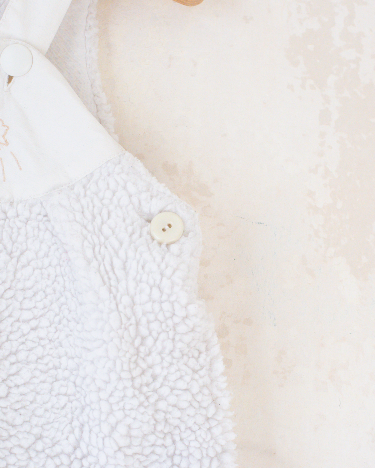 White furry overall by Yves Saint Laurent | 3-6 months