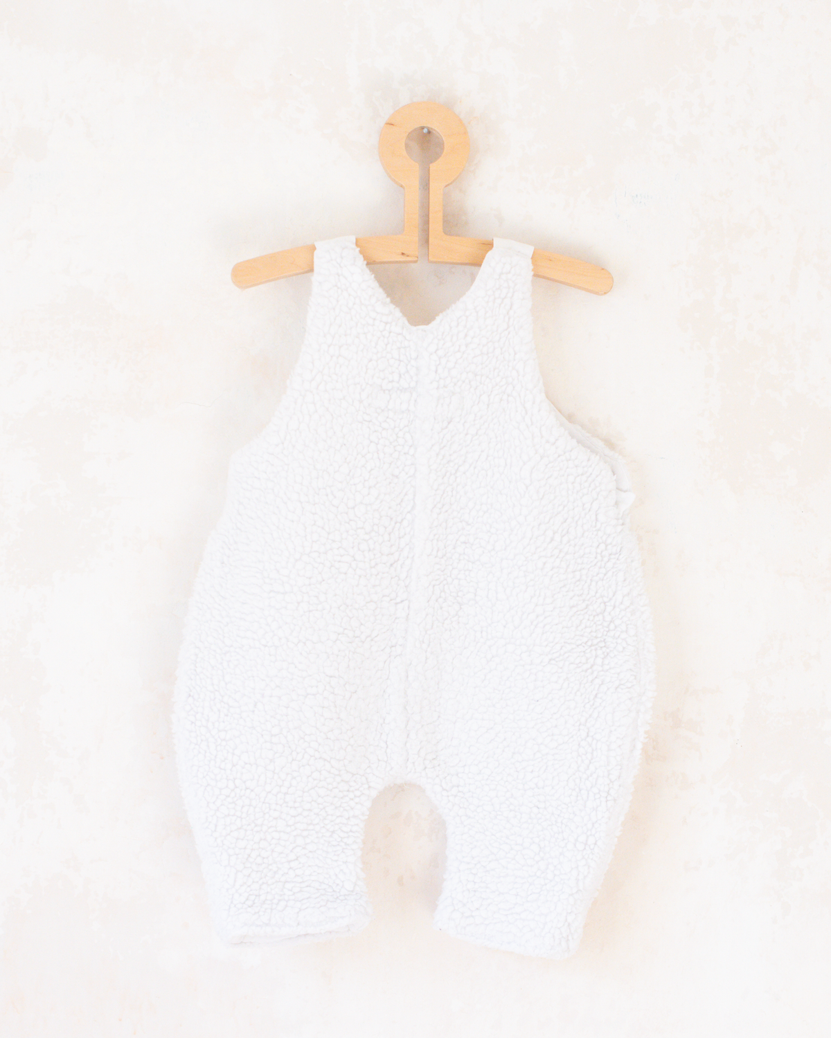 White furry overall by Yves Saint Laurent | 3-6 months