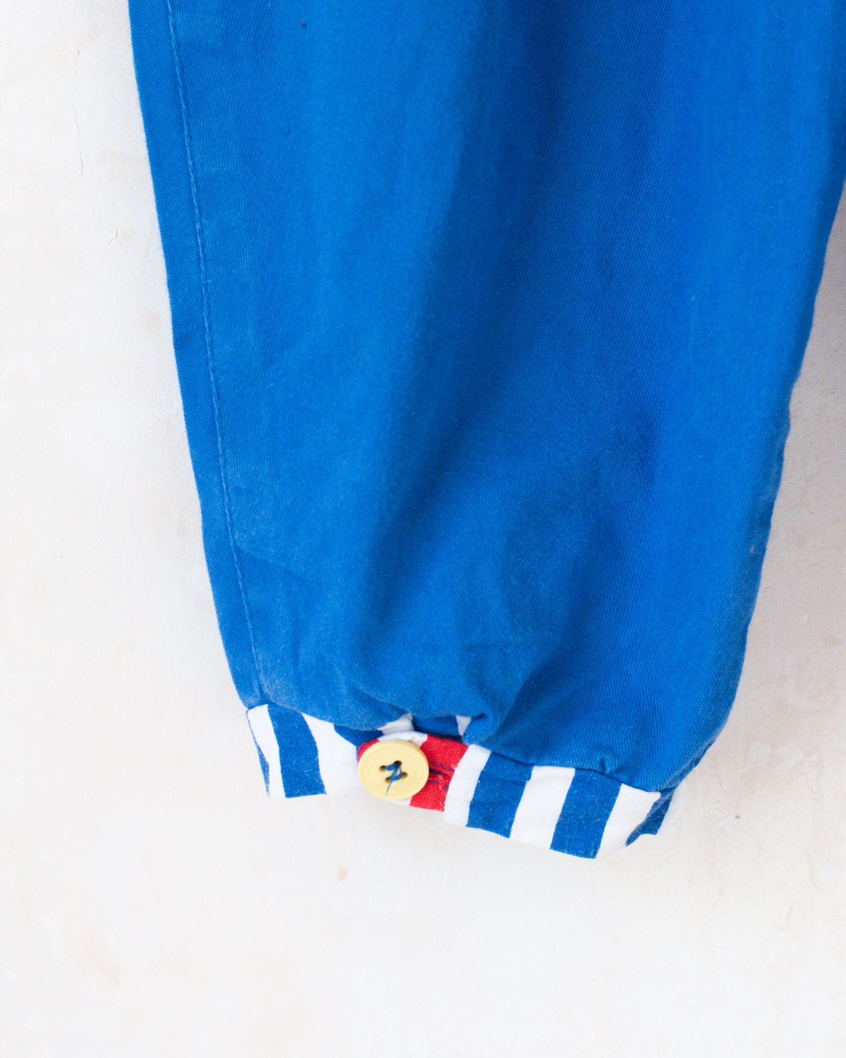 Iconic mouse-print jumpsuit by Yves Saint Laurent | 18-24 months
