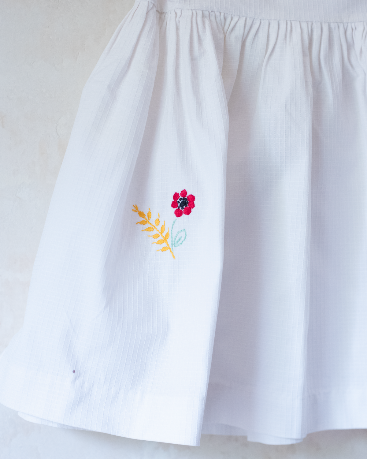 White dress with flower and cornflower embroidery | 12-18 months