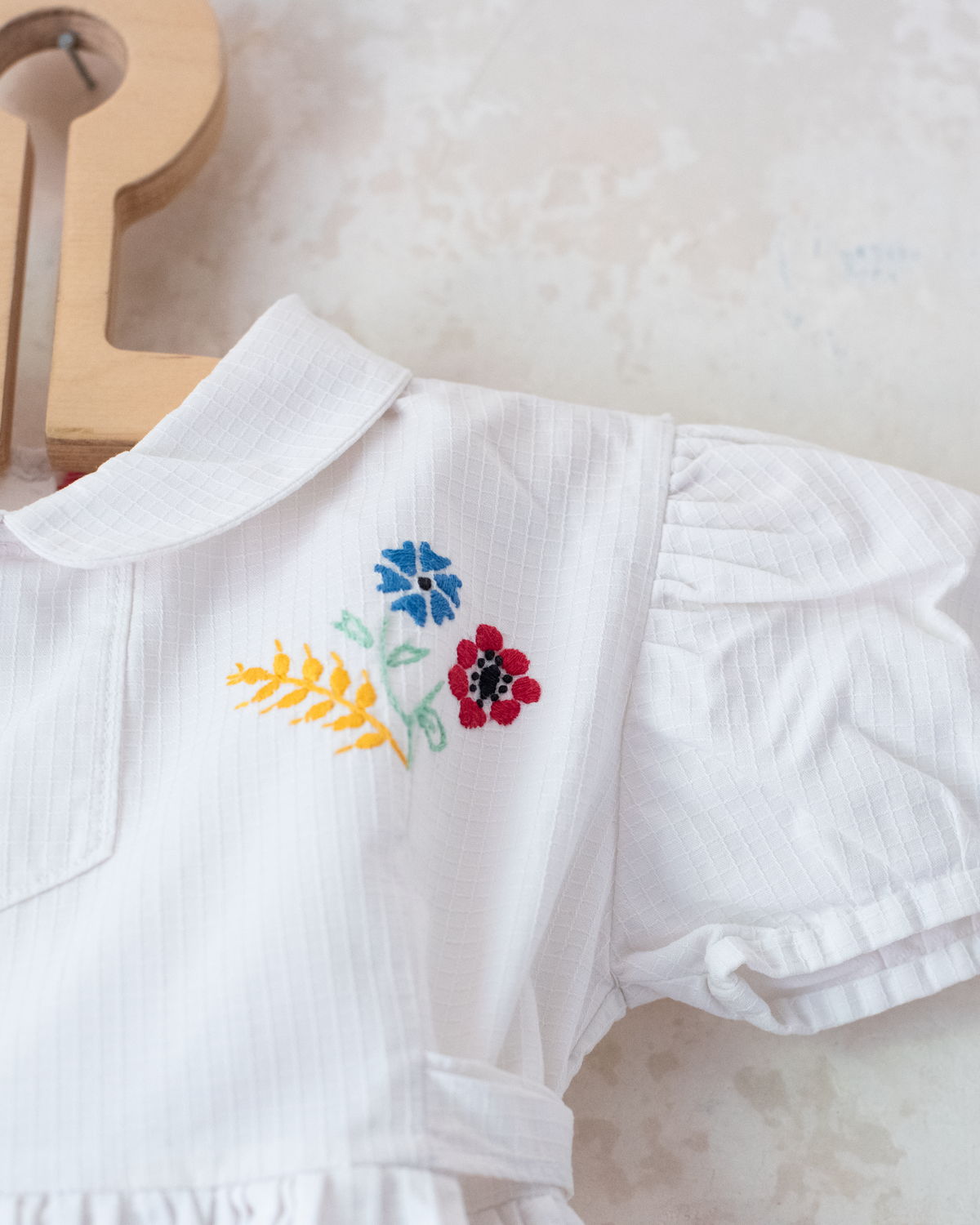 White dress with flower and cornflower embroidery | 12-18 months