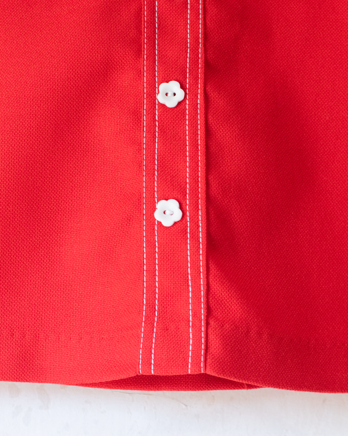 Red Seventies skirt with flower buttons | 8-9 years 