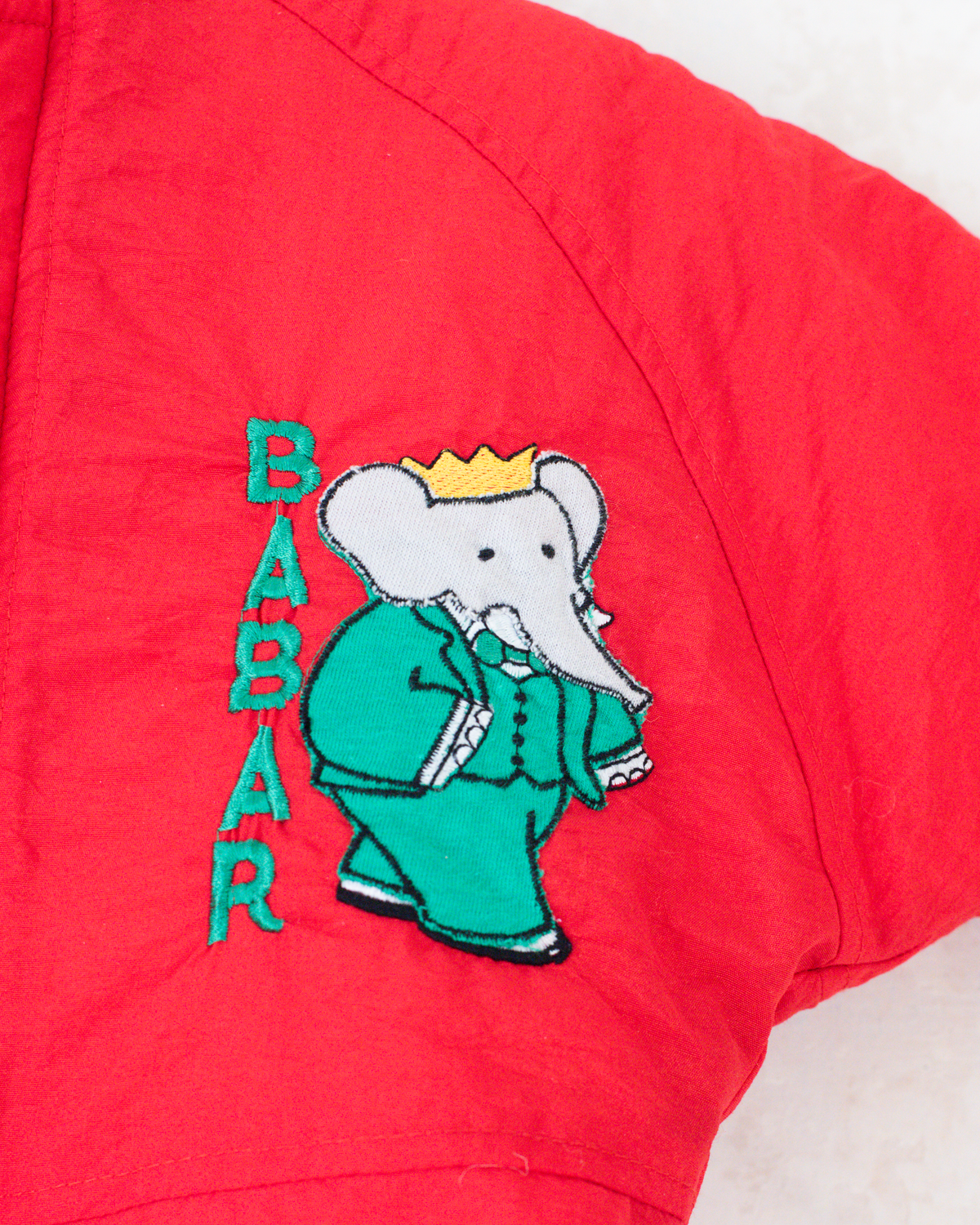 Red snowsuit with the King in the Pub | 6-9 months