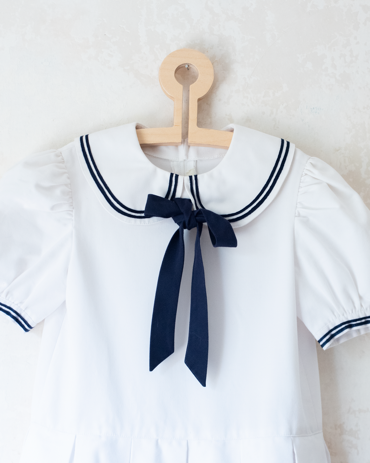 White sailor dress with collar and bow tie | 9-10 years 