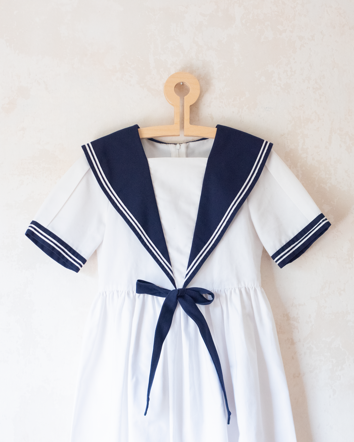 White sailor dress with blue collar and bow tie | 6-7 years