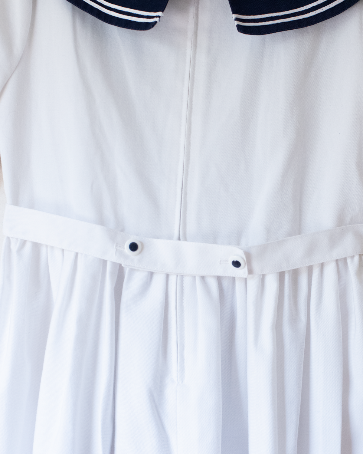 White sailor dress with blue collar and bow tie | 6-7 years