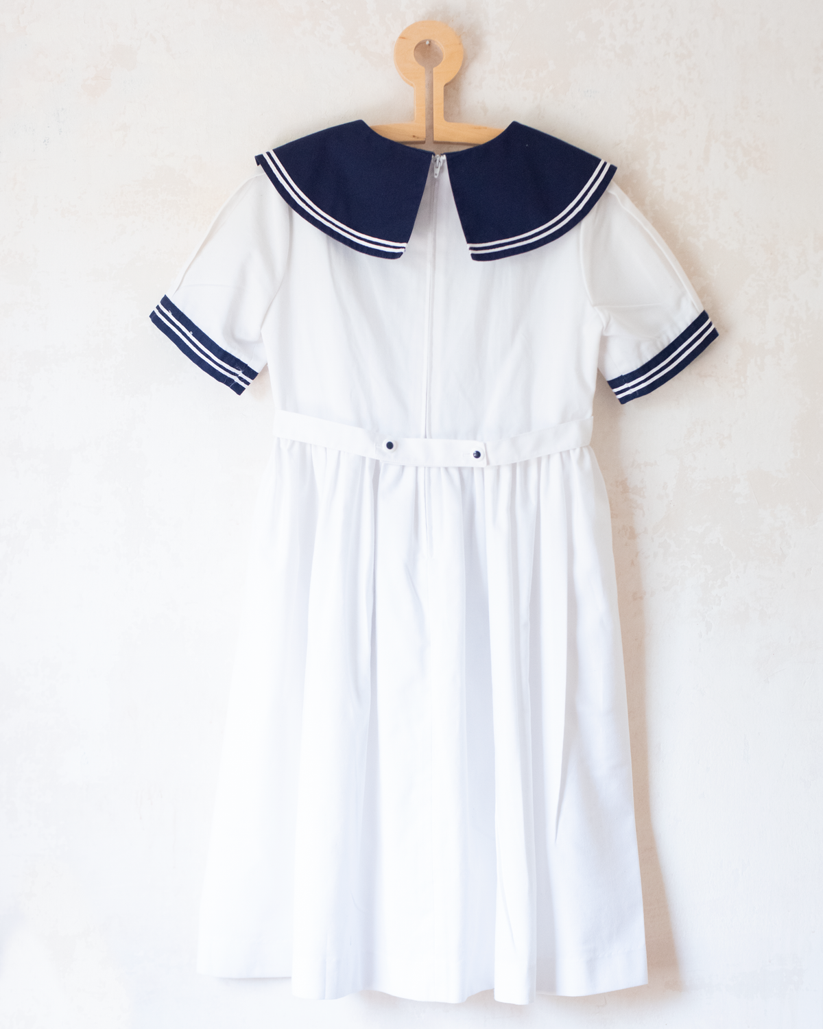 White sailor dress with blue collar and bow tie | 6-7 years