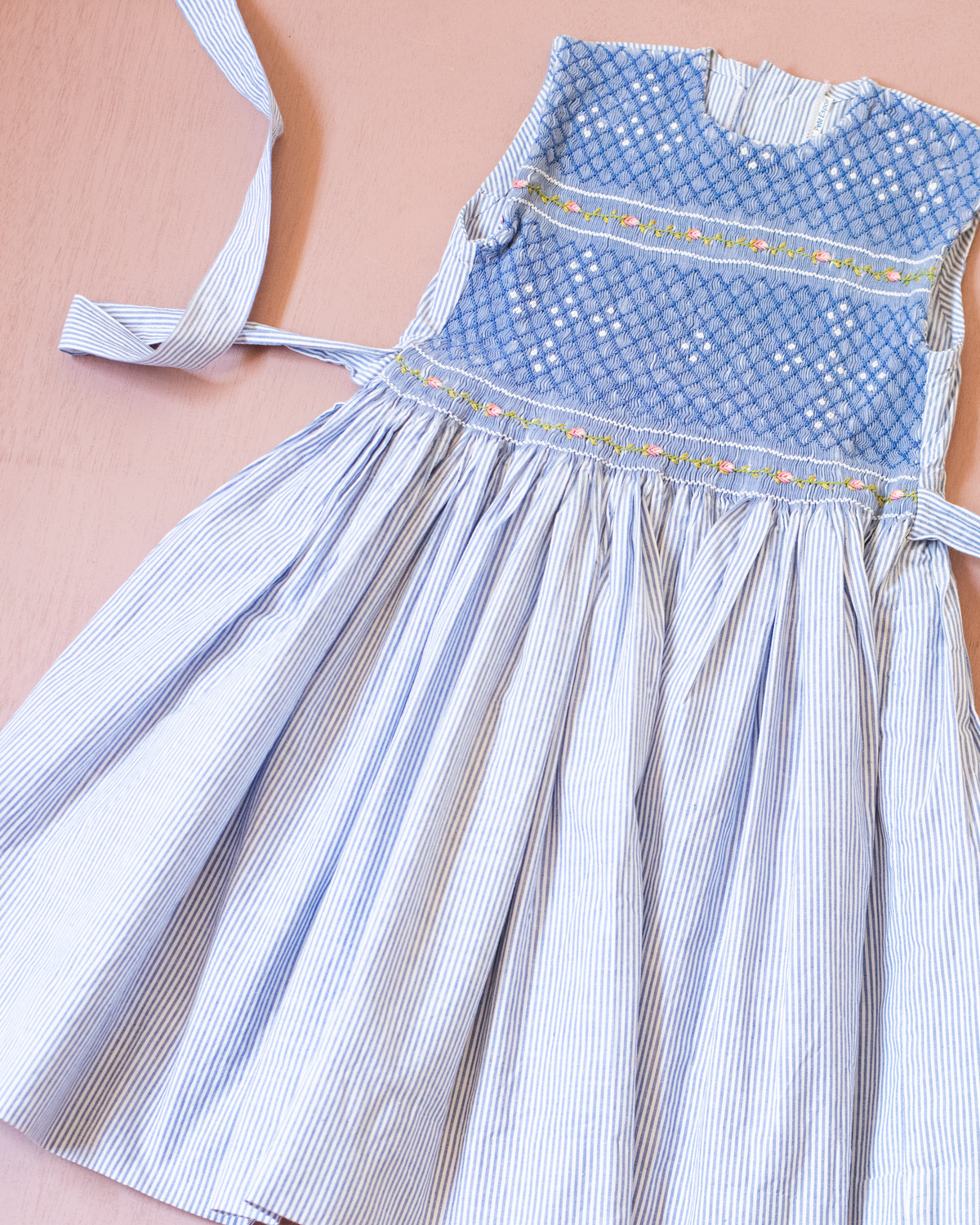 Light blue dress with stripes, ruffles and flowers | 5-6 years