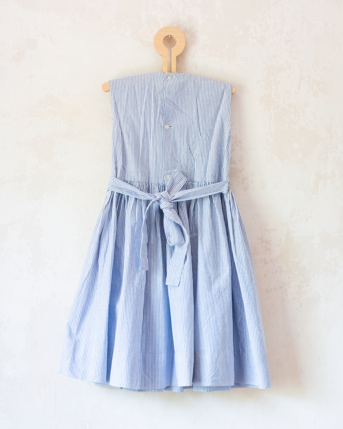 Light blue dress with stripes, ruffles and flowers | 5-6 years