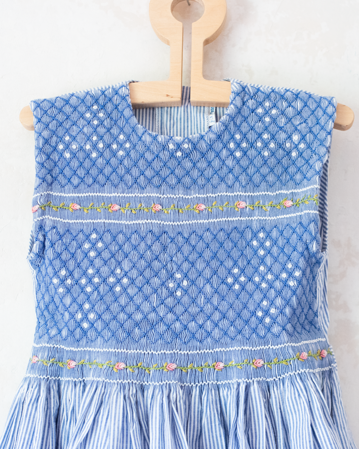 Light blue dress with stripes, ruffles and flowers | 5-6 years