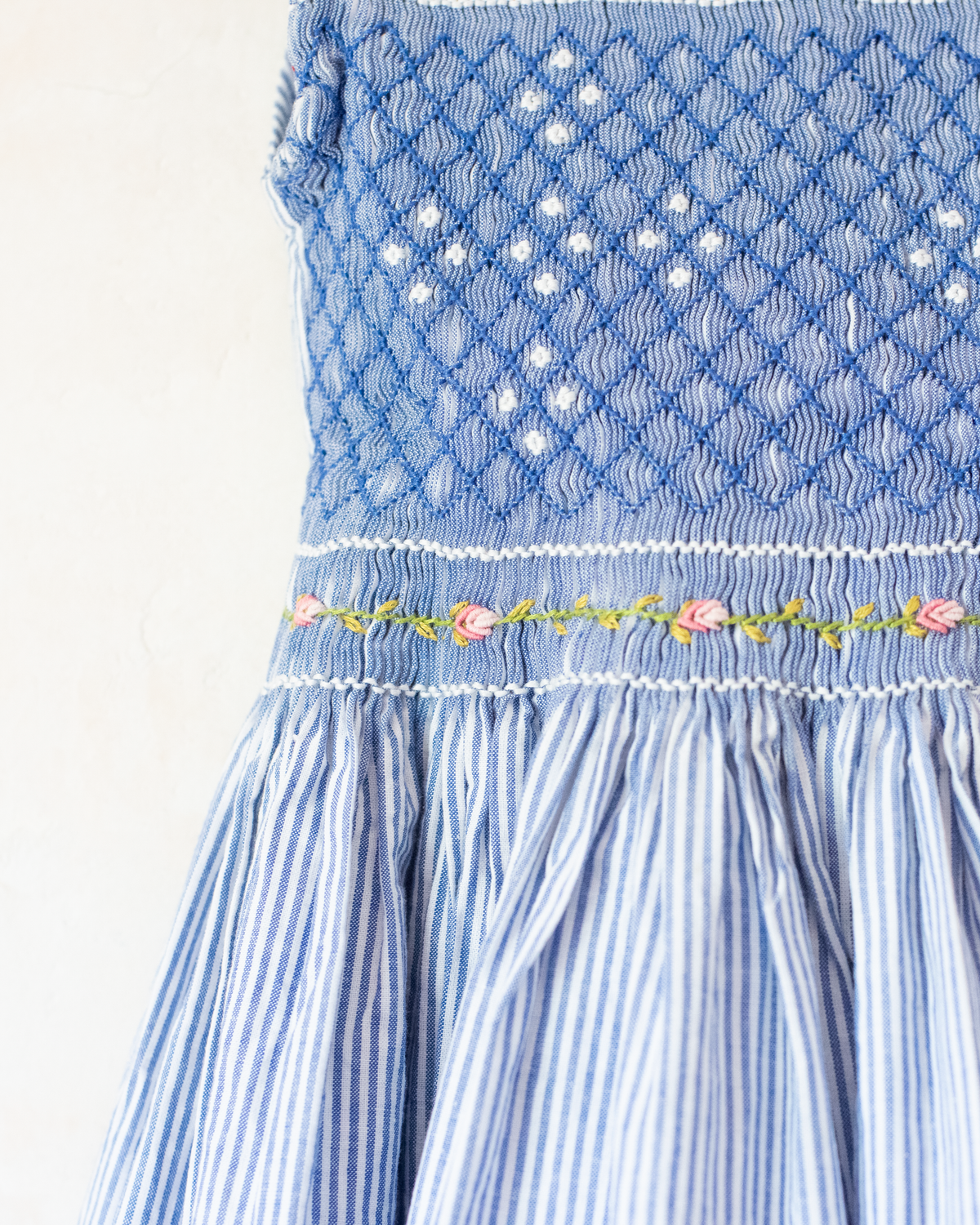 Light blue dress with stripes, ruffles and flowers | 5-6 years