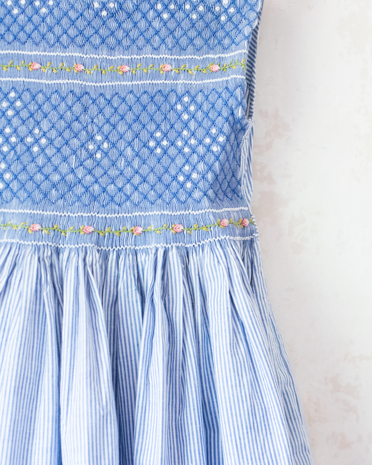 Light blue dress with stripes, ruffles and flowers | 5-6 years