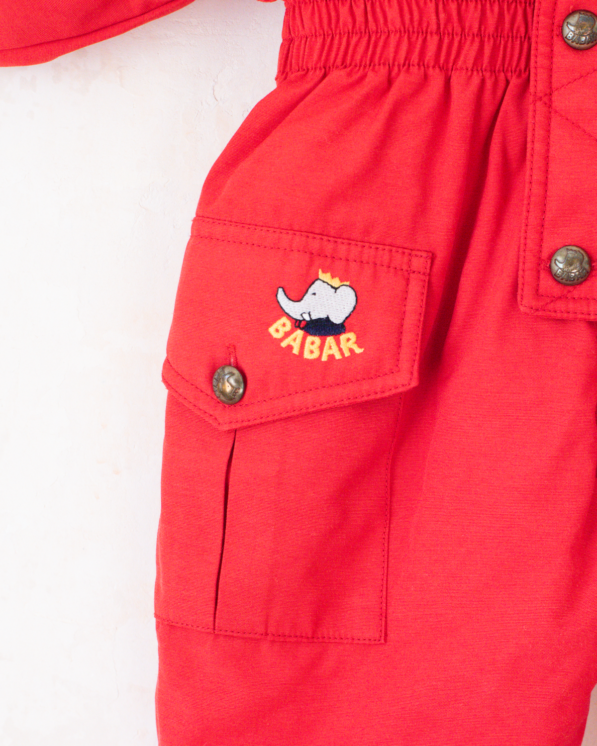 Red fleece jumpsuit with Lion King embroidery | 12-18 months