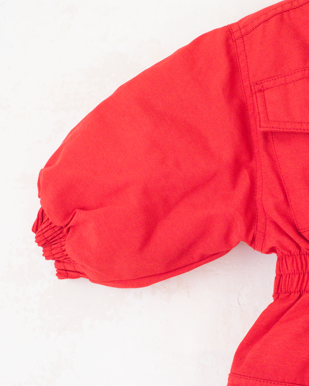 Red fleece jumpsuit with Lion King embroidery | 12-18 months
