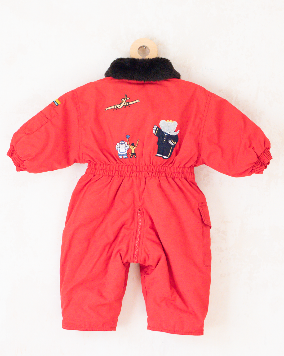 Red fleece jumpsuit with Lion King embroidery | 12-18 months