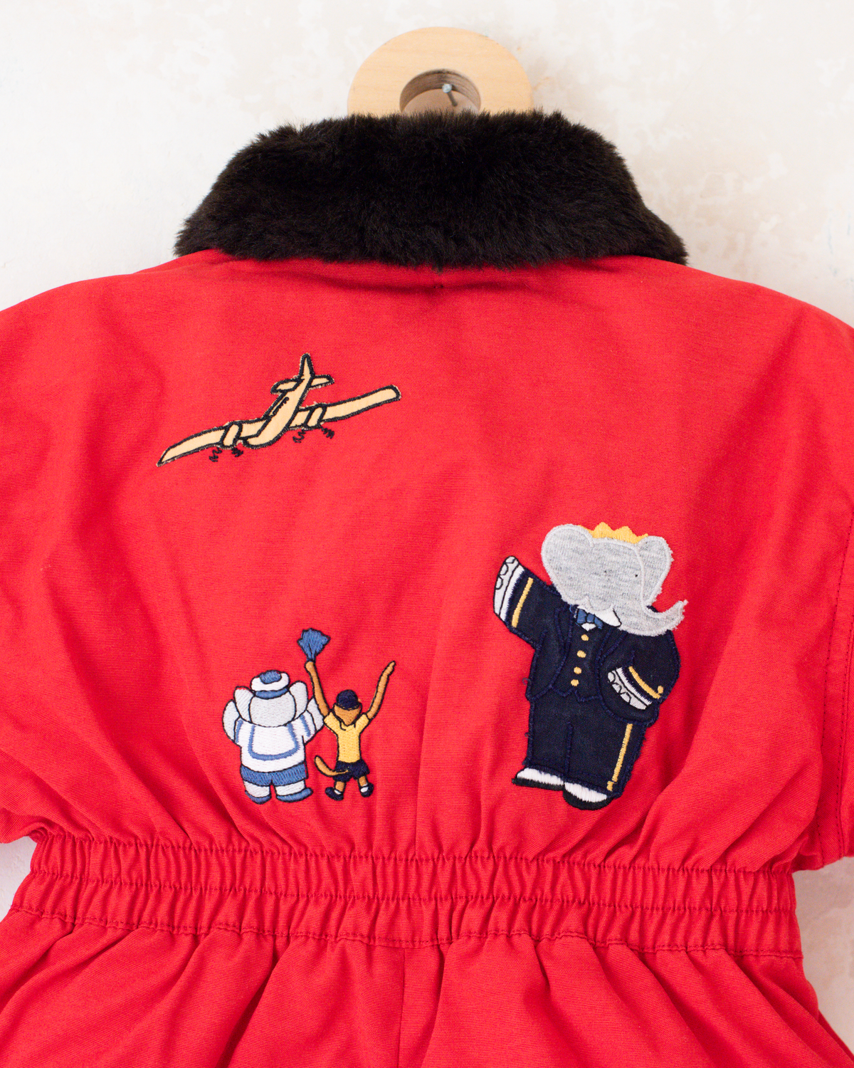 Red fleece jumpsuit with Lion King embroidery | 12-18 months