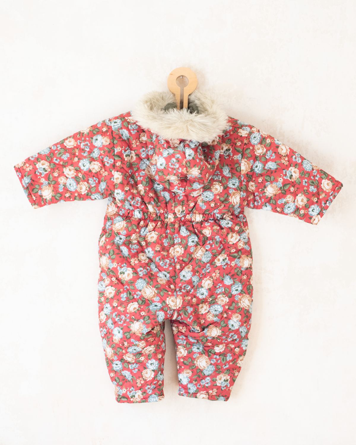 Floral snowsuit with a fur hood | 12-18 months