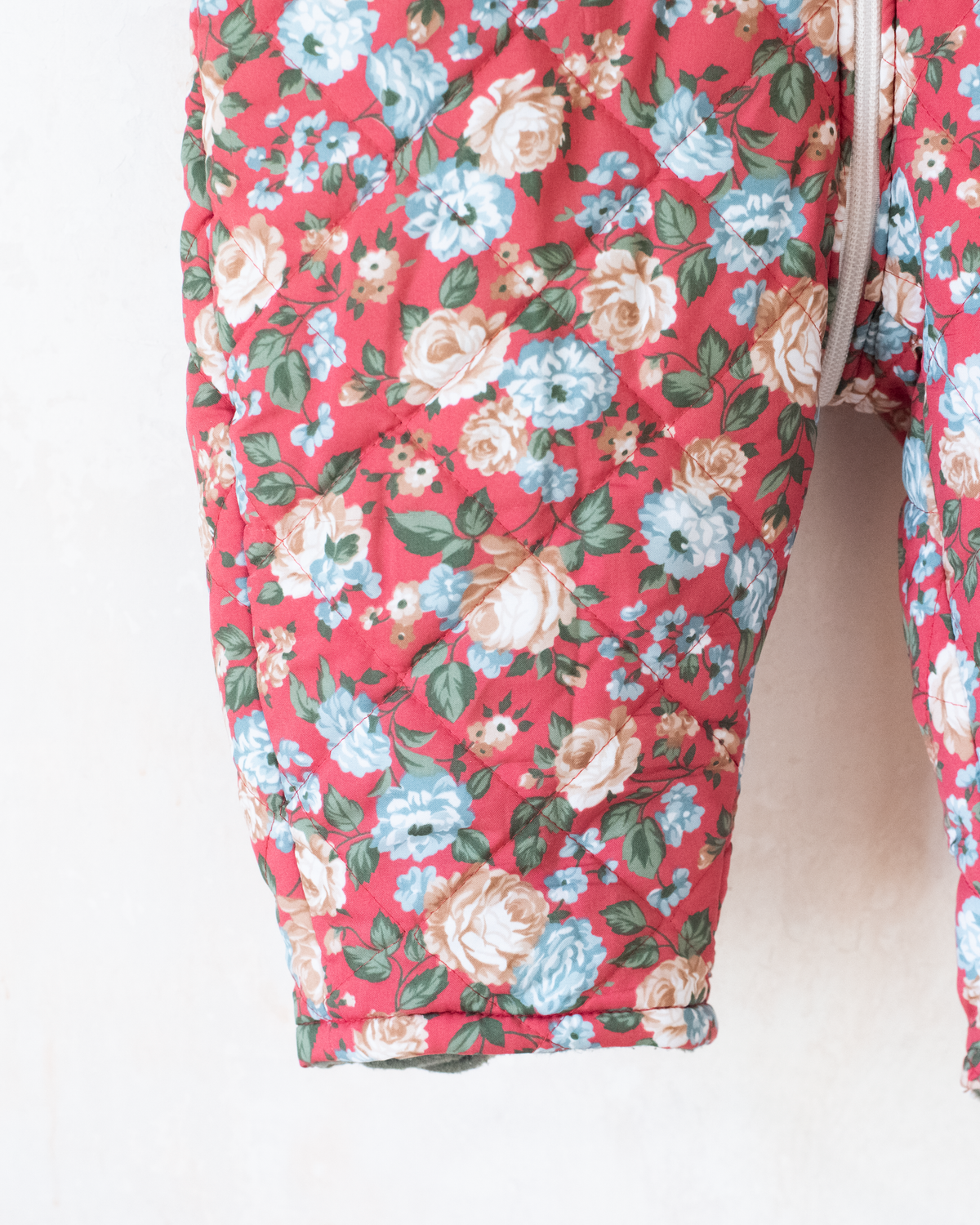 Floral snowsuit with a fur hood | 12-18 months