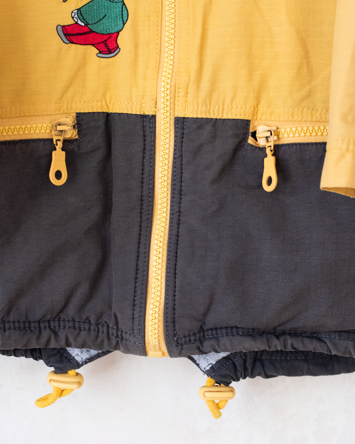 Brown and yellow jacket with embroideries of the King in Bubber | 5-6 years