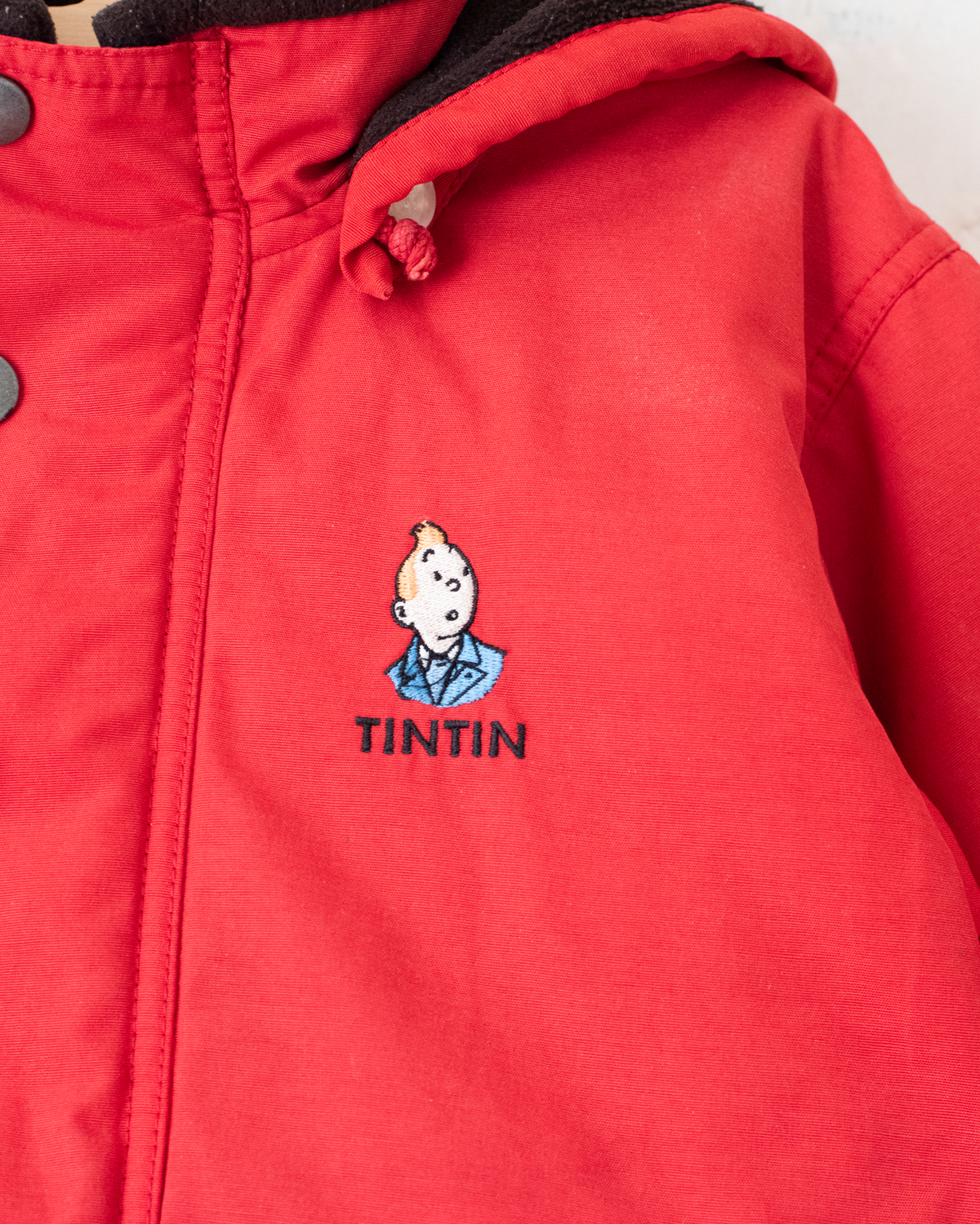Red coat with Tintin embroidery | 5-6 years