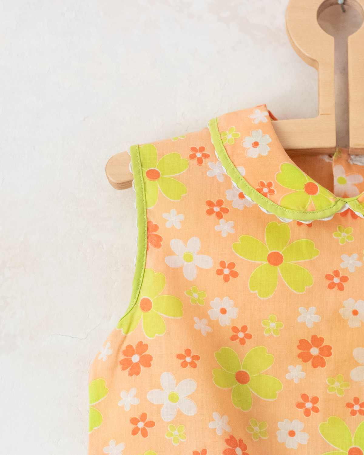 Seventies floral dress in shades of orange | 2-3 years