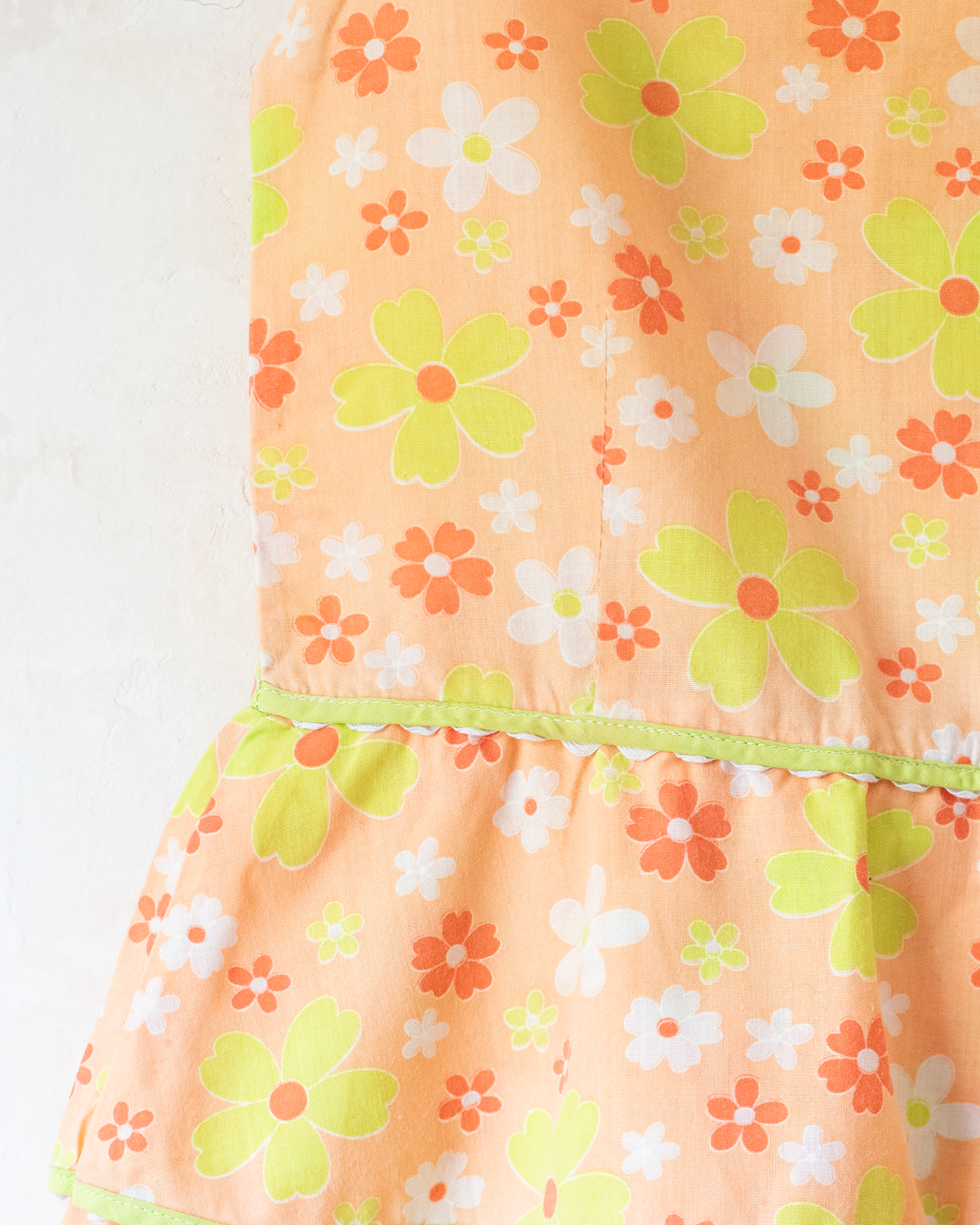 Seventies floral dress in shades of orange | 2-3 years