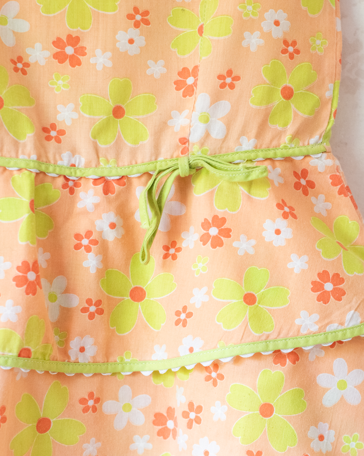 Seventies floral dress in shades of orange | 2-3 years