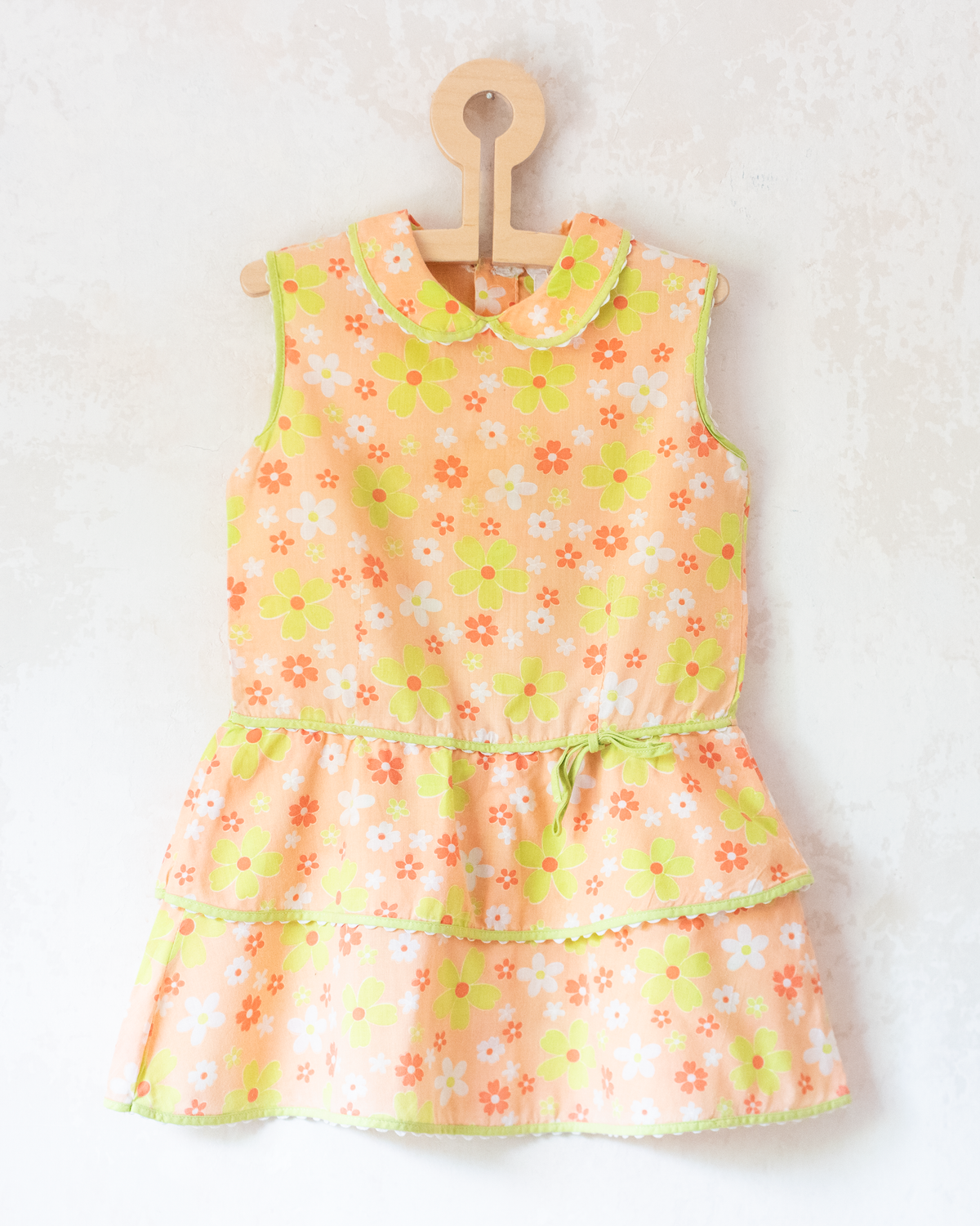 Seventies floral dress in shades of orange | 2-3 years