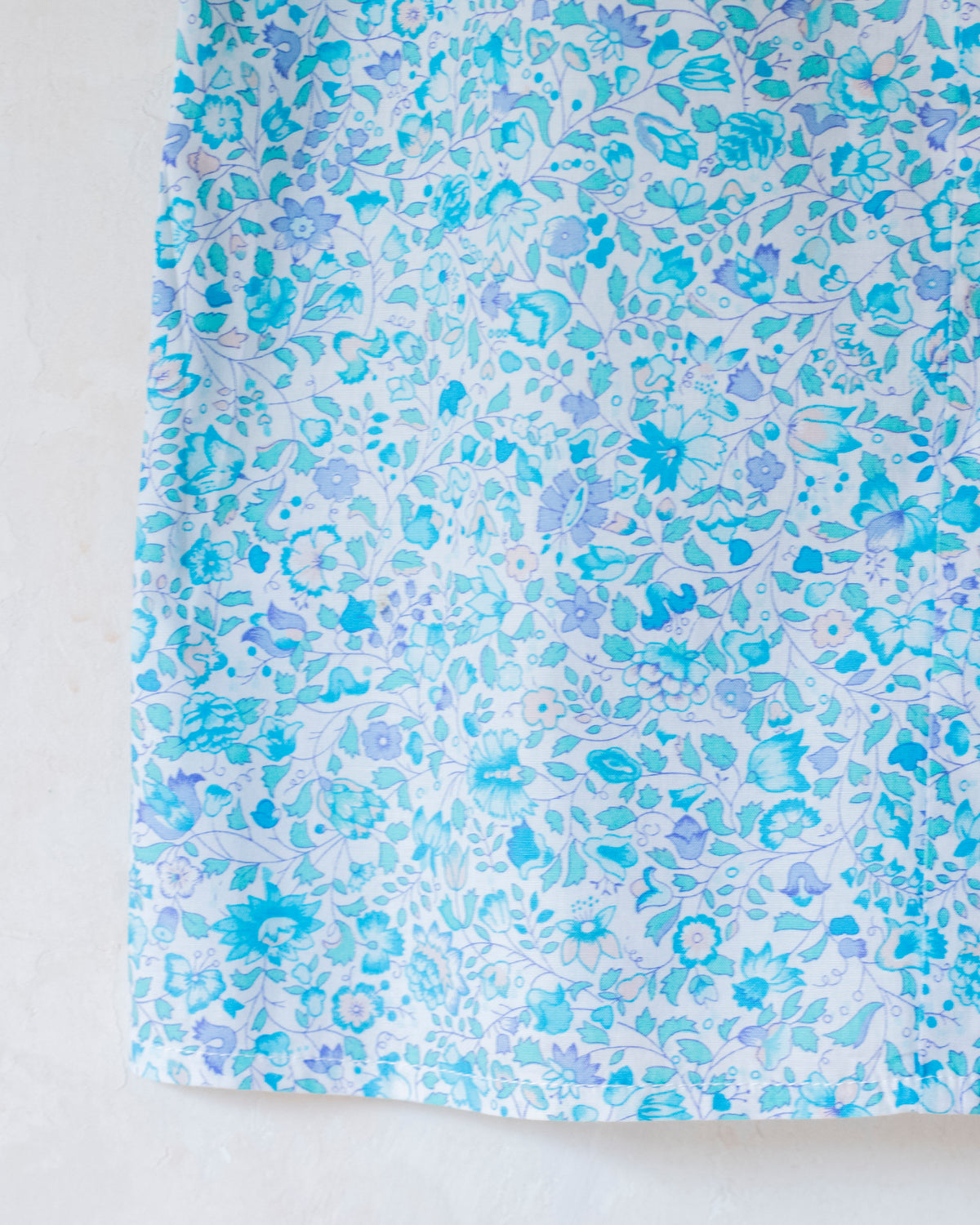 Floral shirt and skirt in shades of light blue | 10-11 years