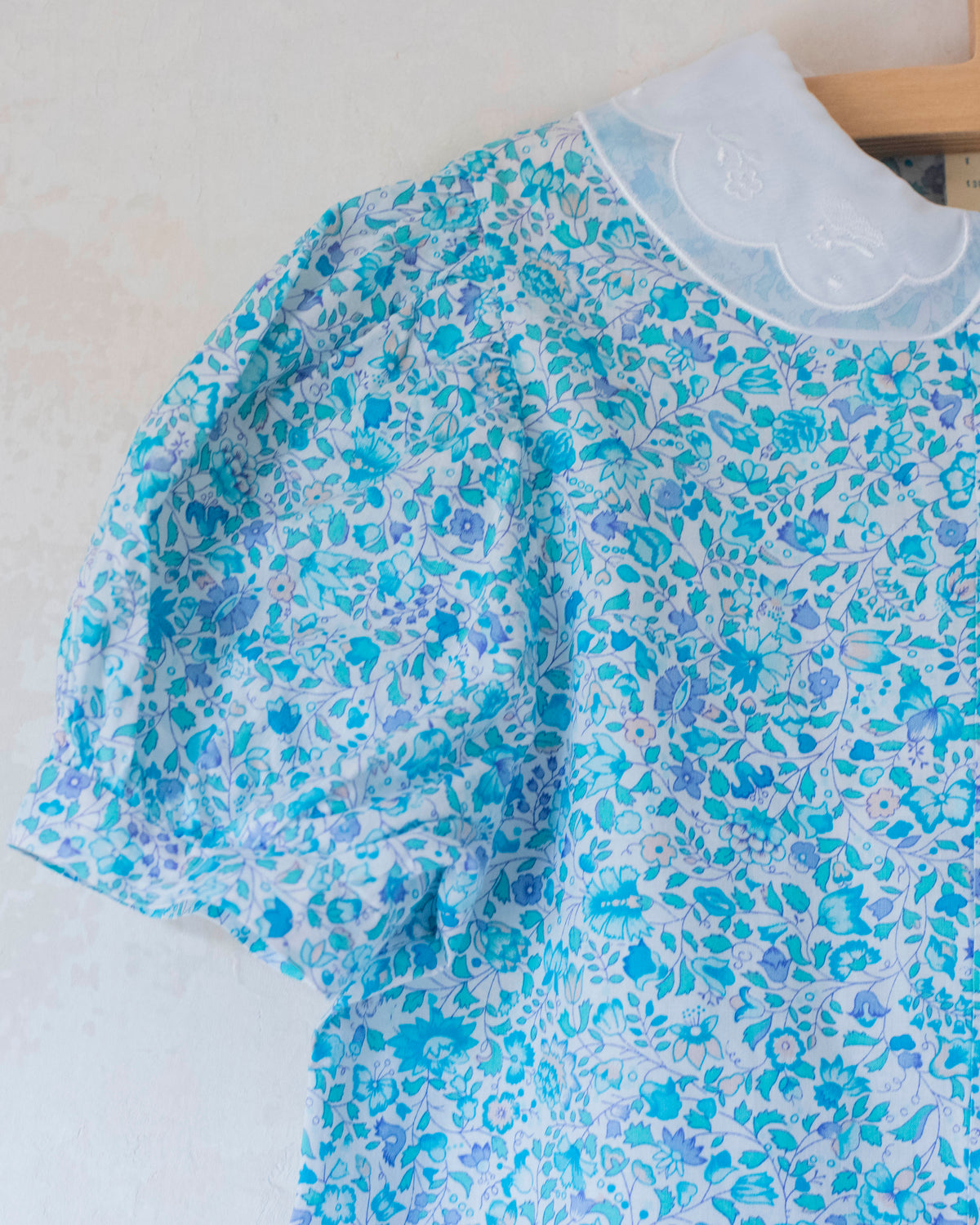 Floral shirt and skirt in shades of light blue | 10-11 years