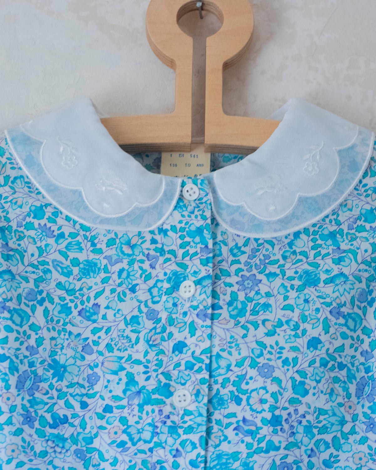 Floral shirt and skirt in shades of light blue | 10-11 years