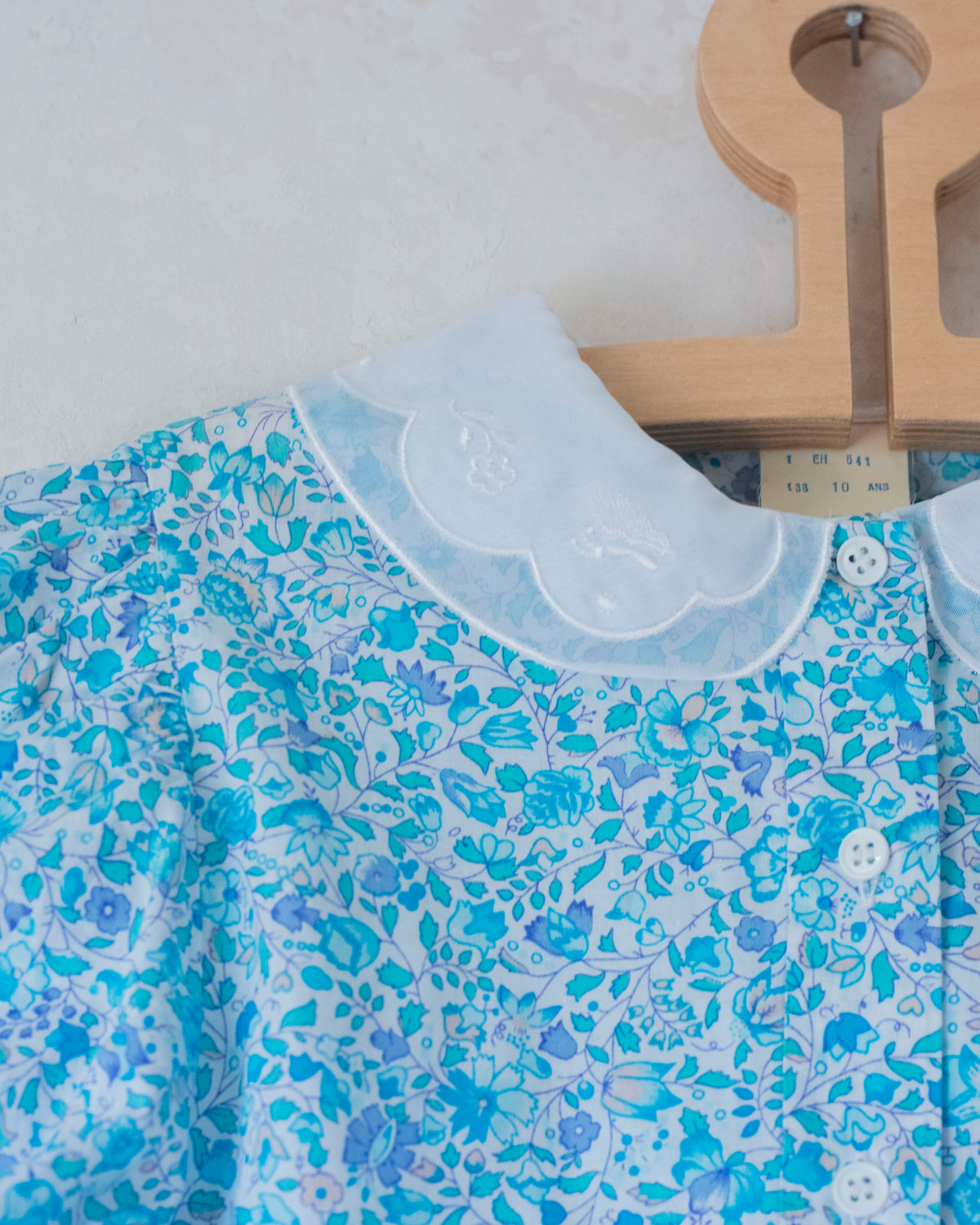Floral shirt and skirt in shades of light blue | 10-11 years