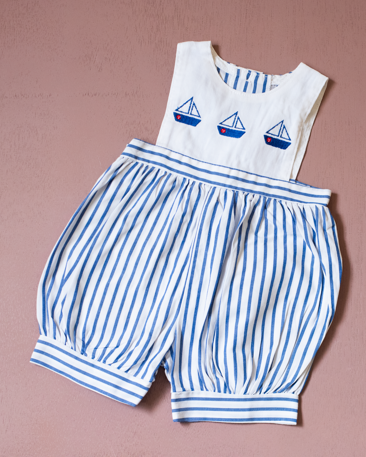 Jumpsuit with stripes and embroidered sailboats | 0-3 months