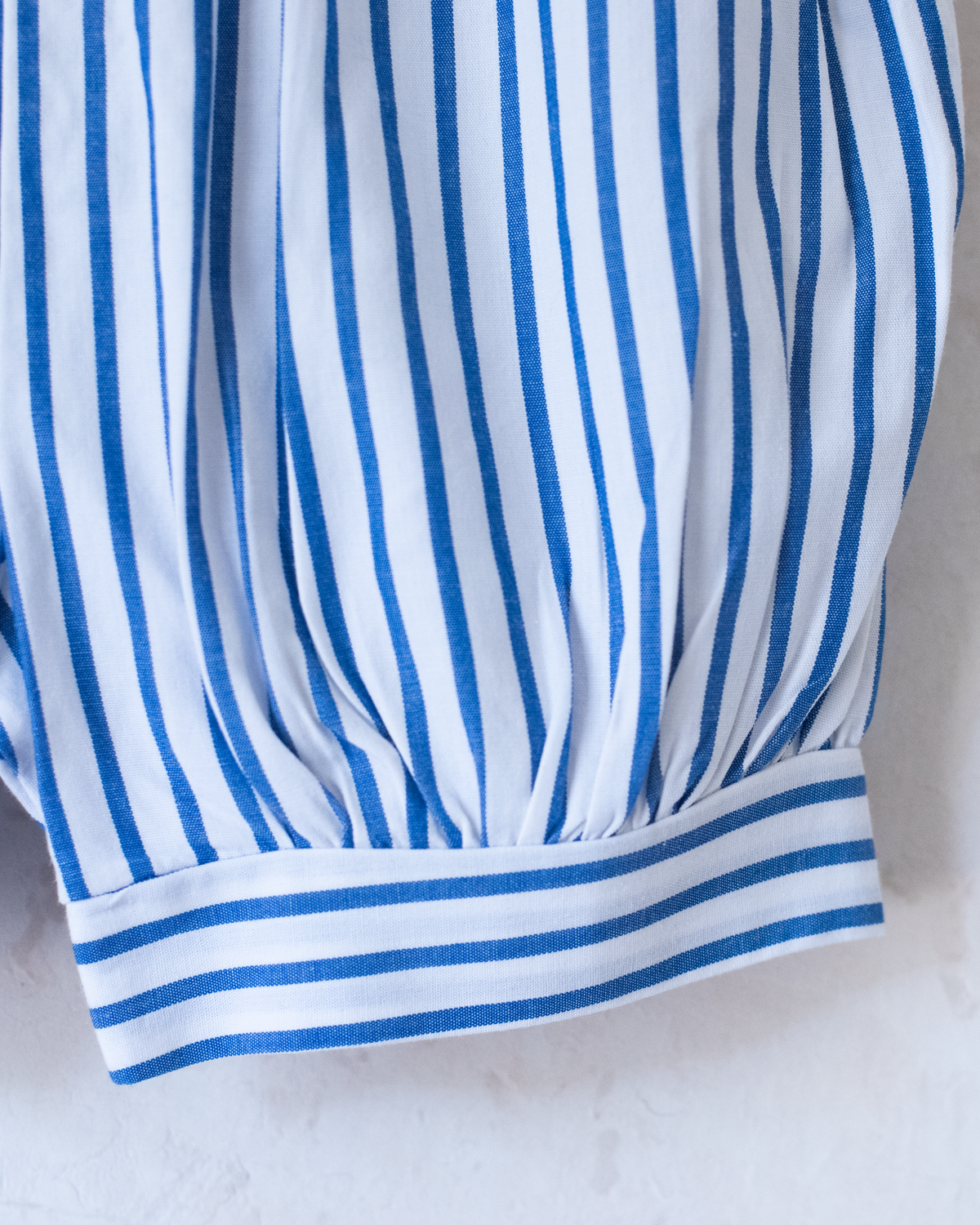 Jumpsuit with stripes and embroidered sailboats | 0-3 months