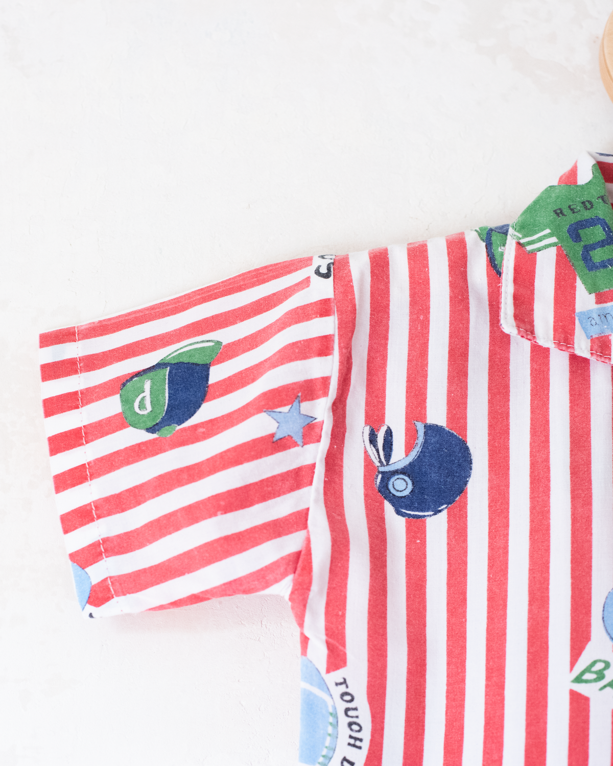 Striped button-down shirt with sports prints | 2-3 years