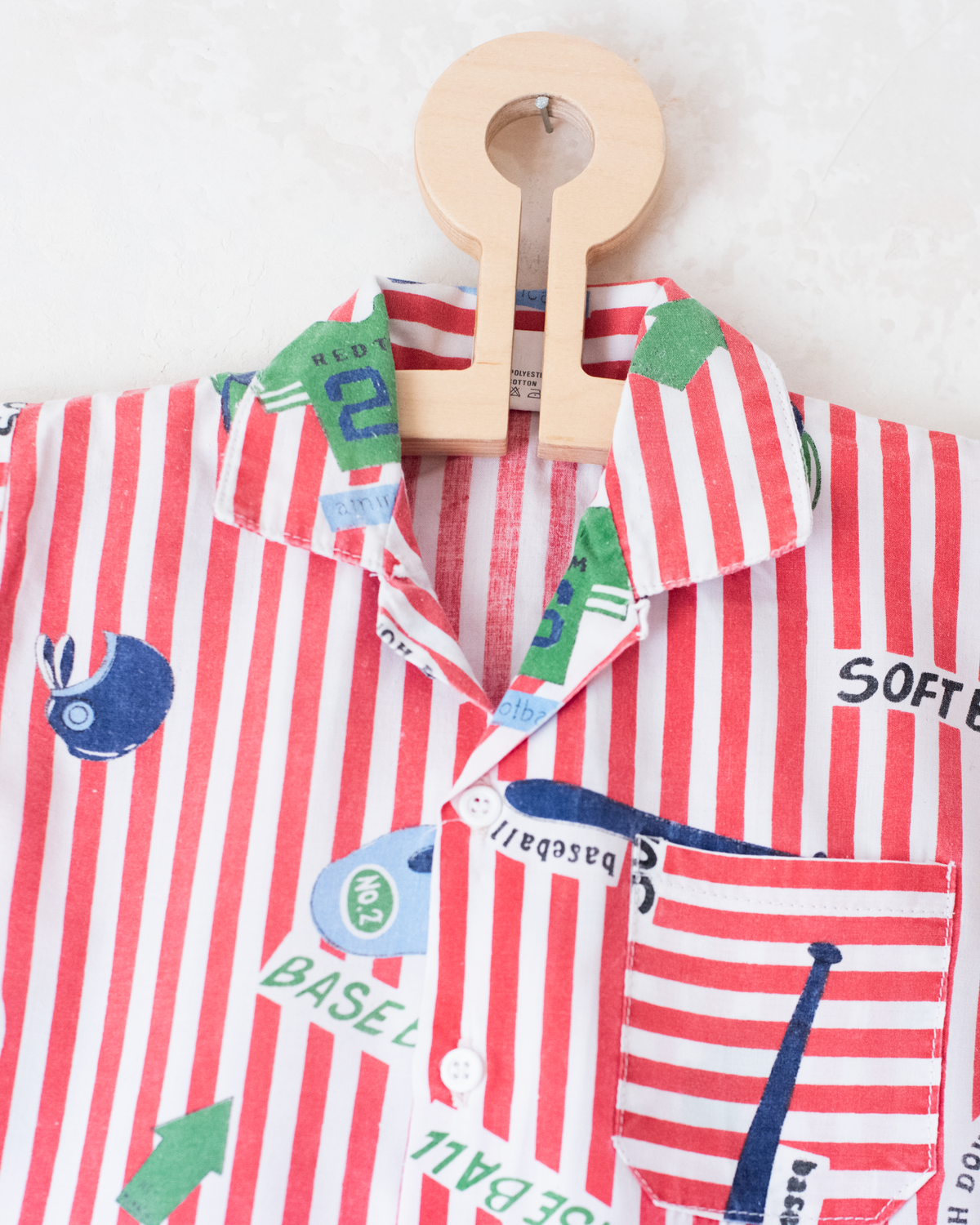 Striped button-down shirt with sports prints | 2-3 years