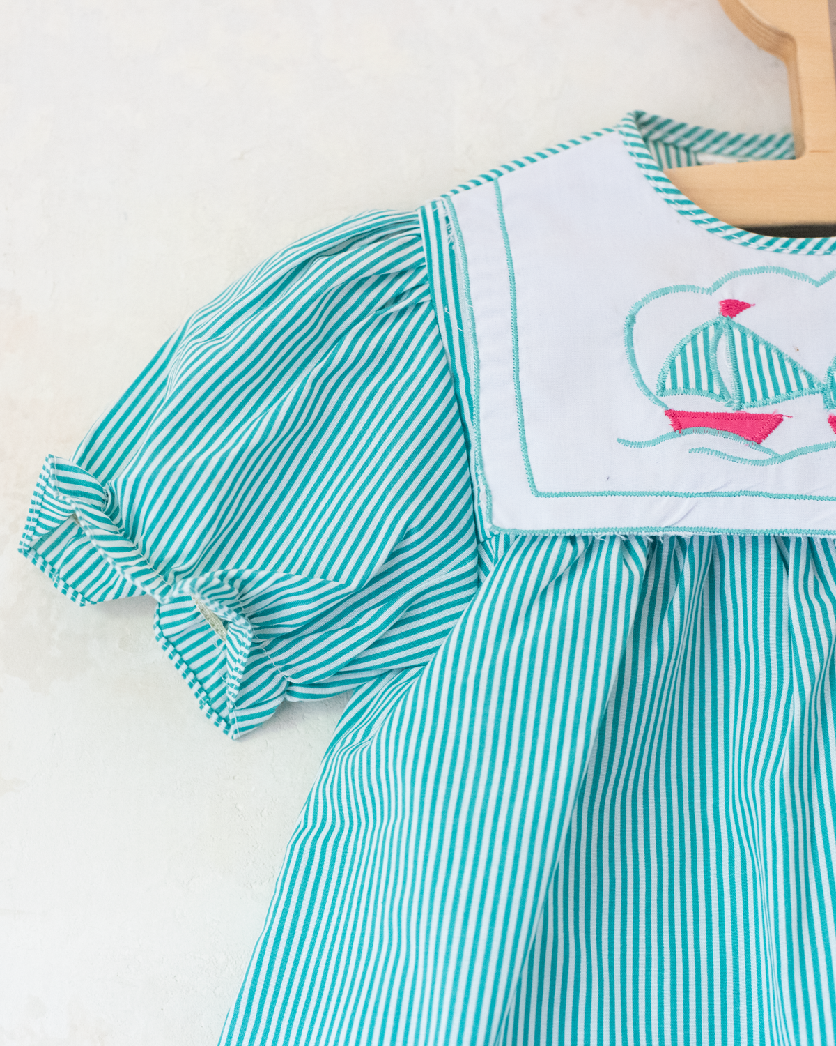 Striped dress with fisherman collar and embroidered boats | 9-12 months