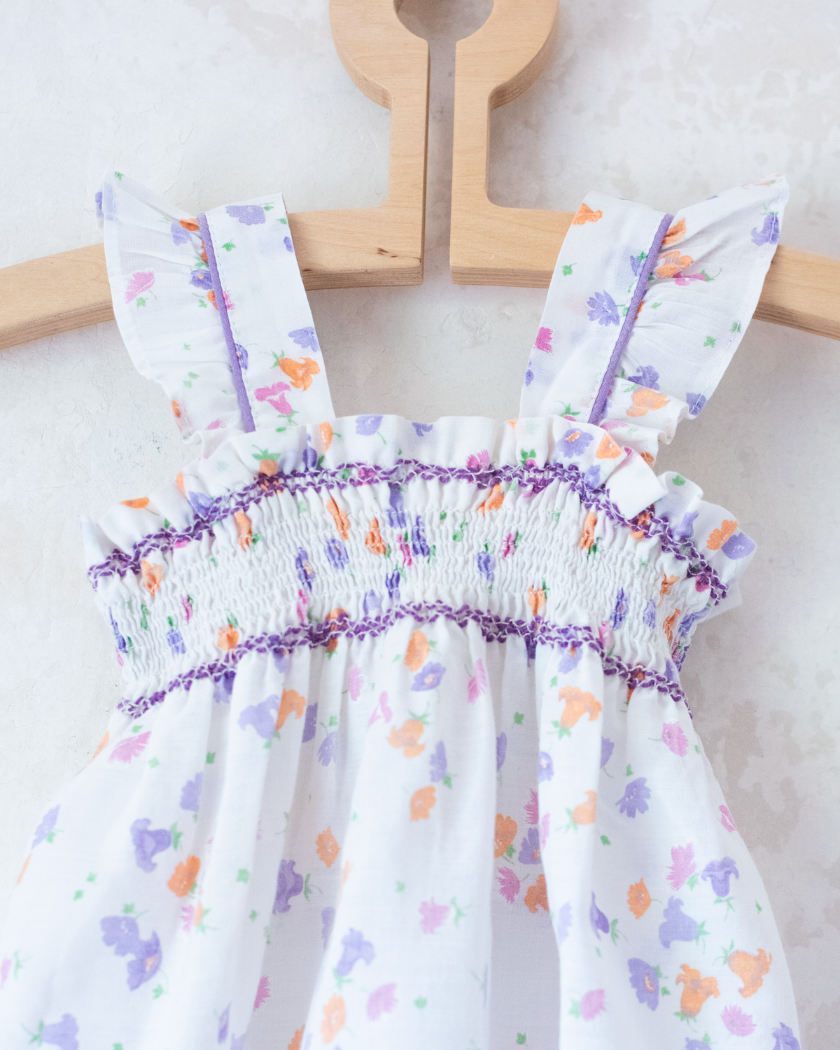White floral dress with ruffle straps | 12-18 months