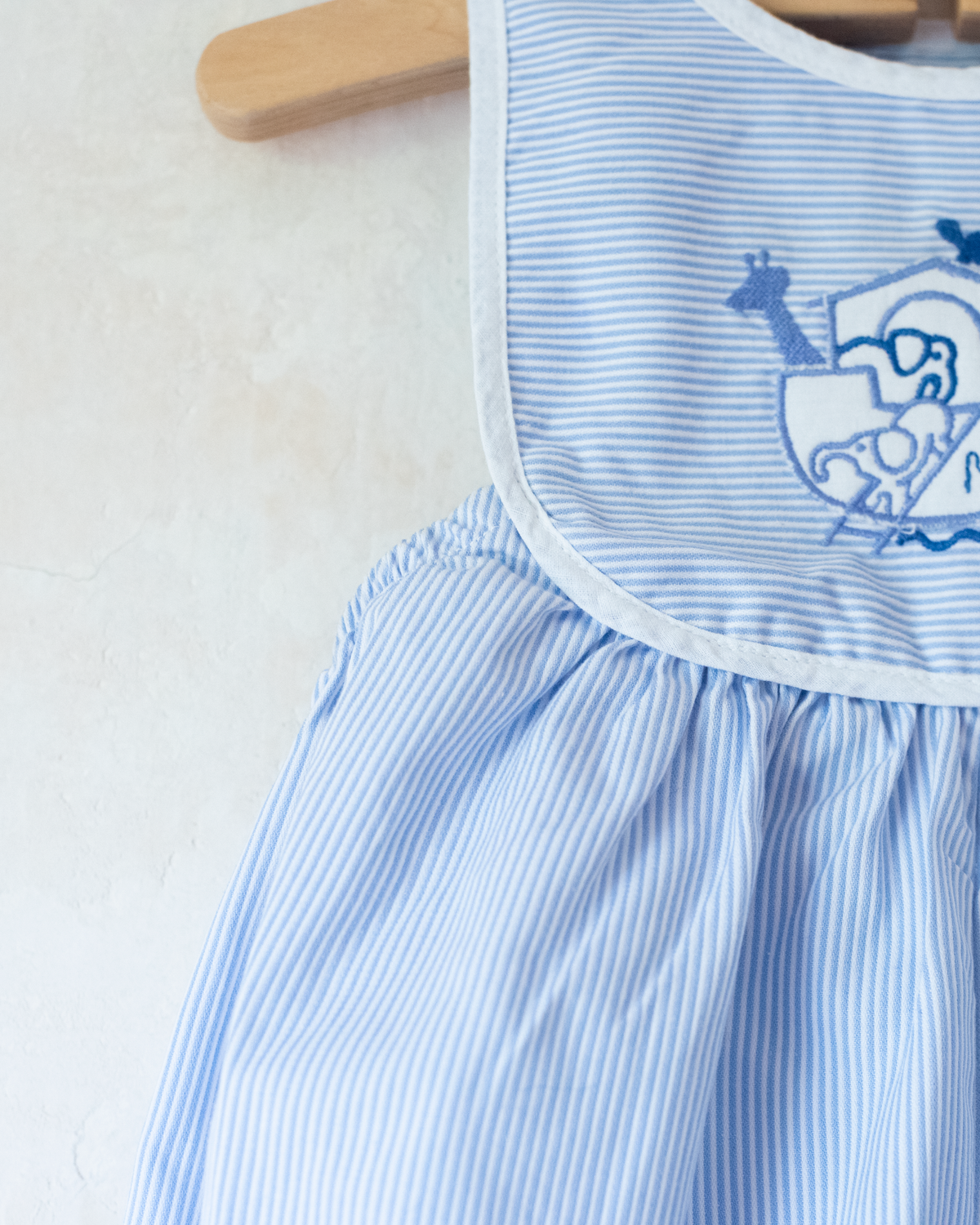 Striped jumpsuit with embroidered comforter from Yves Saint Laurent | 9-12 months