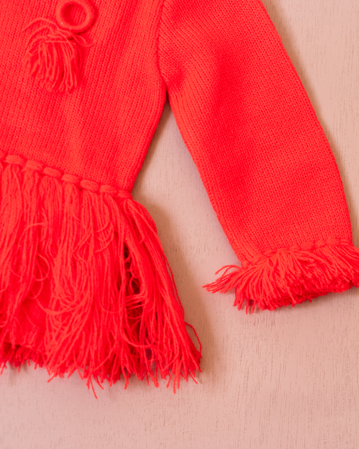 Red knit with fringes | French deadstock from the 70s | 9-12 months