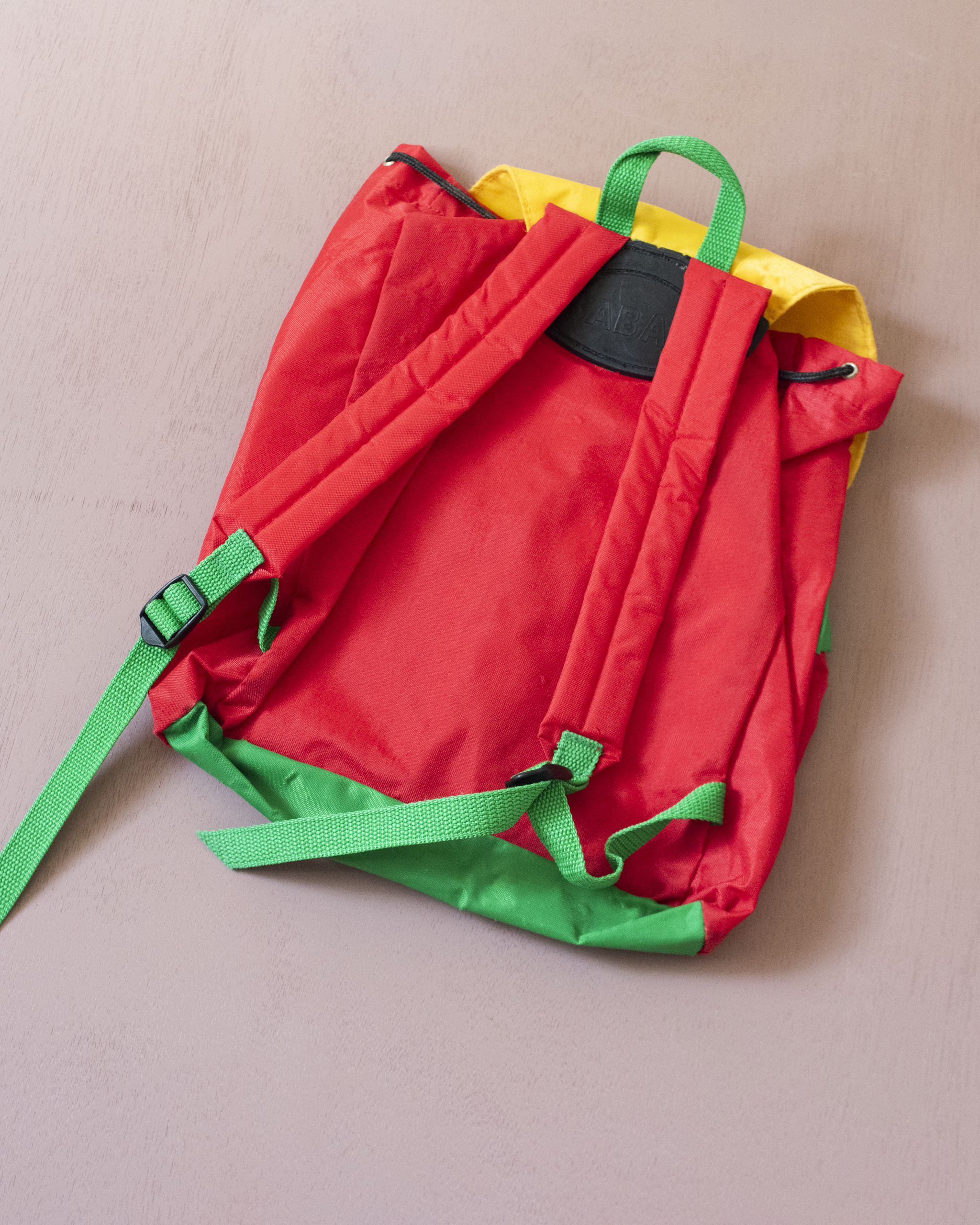 תיק גב אדום | המלך בבר