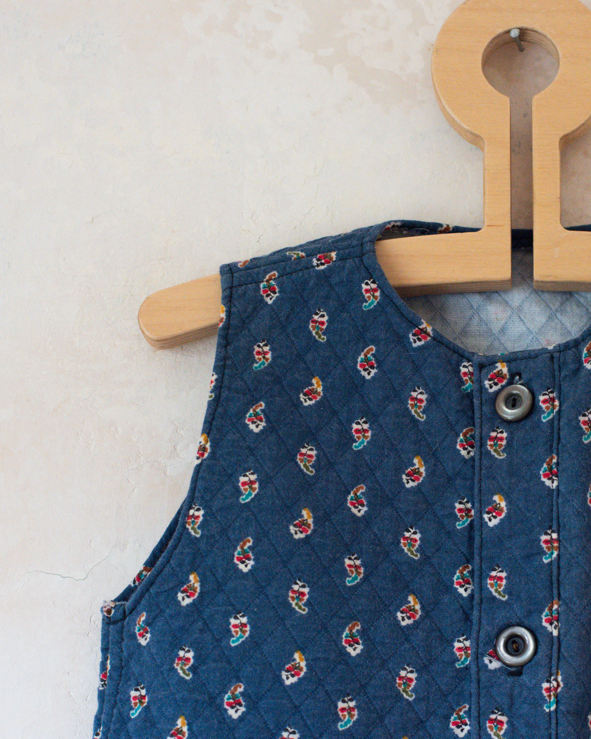 Blue vest with colorful paisley | 12-18 months
