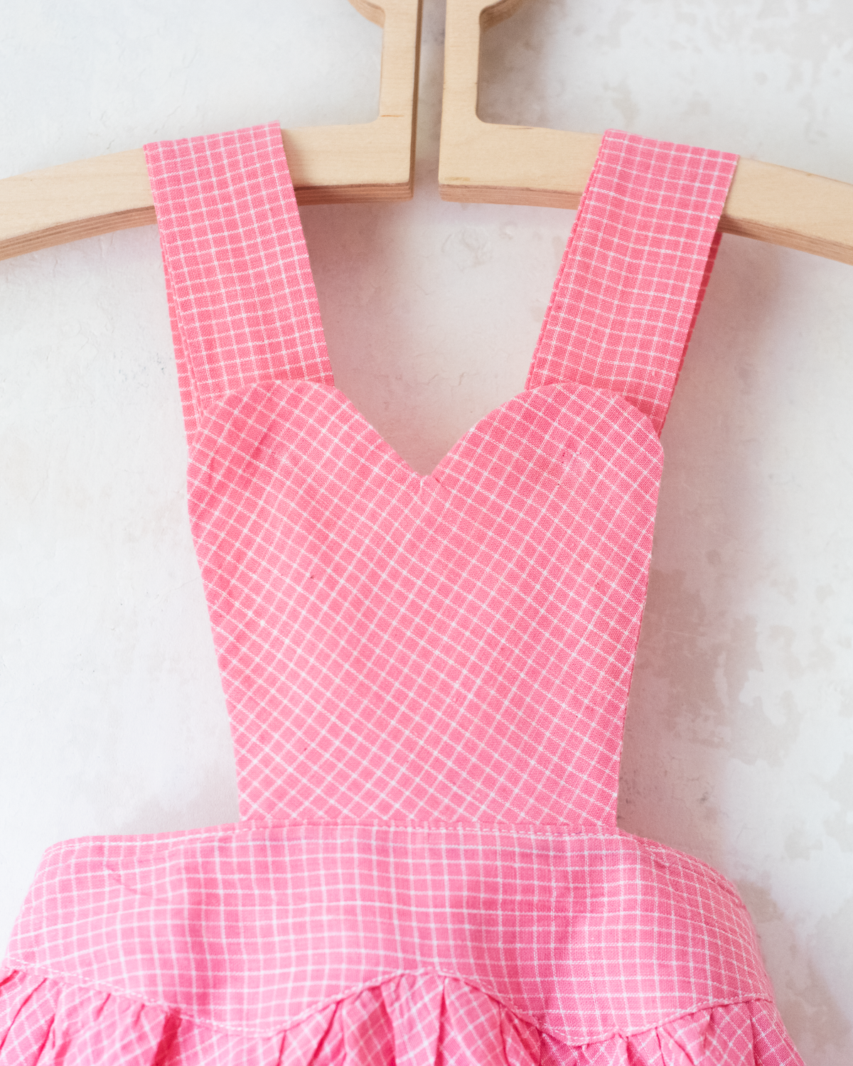 Pink heart-shaped plaid romper | 12-18 months
