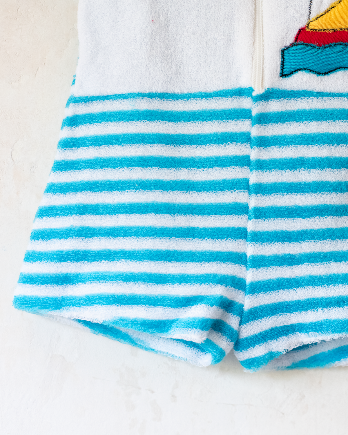 Towelling overalls with stripes and a lighthouse | Spanish dead stock | 6-9 months