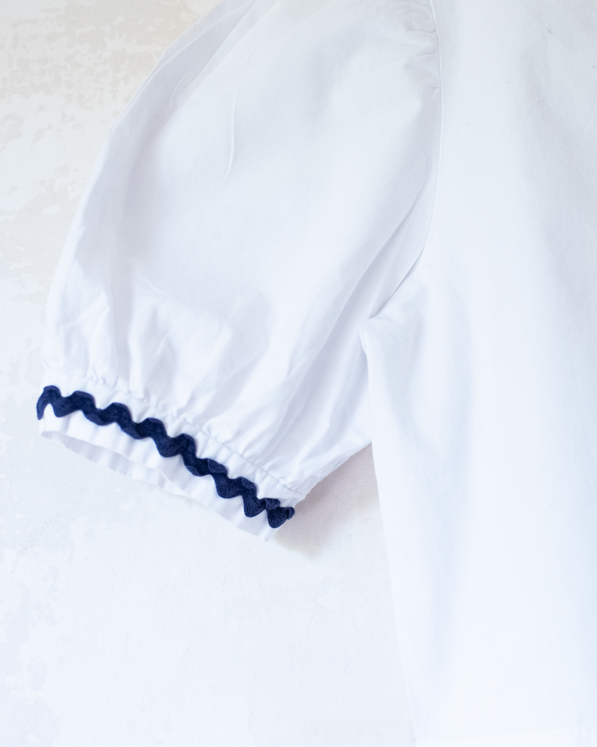 White camisole with lace and pocket | 9-10 years