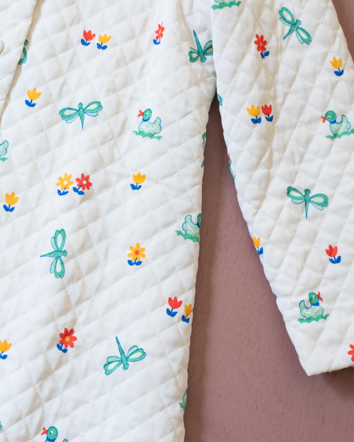 Synthetic jacket with nostalgic prints | 7-8 years